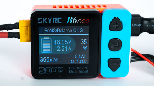 SKYRC B6neo battery charger with display on a white background